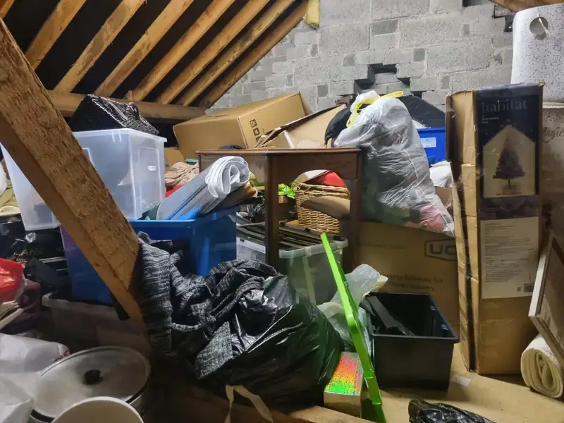 House clearance in Ballyboden – attic full of furniture and boxes before clearing