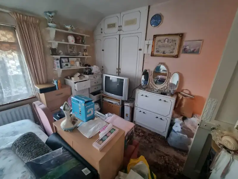 Bedroom clearance in progress – contents being sorted for removal, recycling and donation