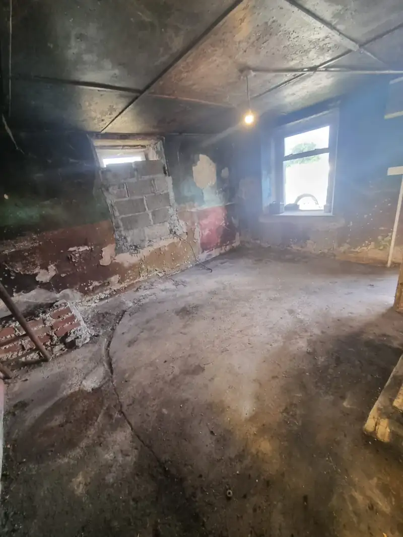 Room in a neglected property cleared of all contents