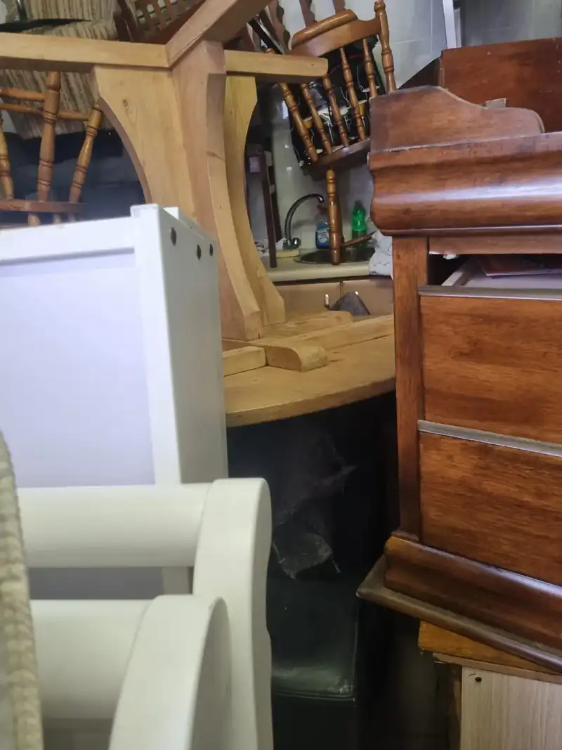 Furniture stacked and loaded for removal by the Property Clearance team