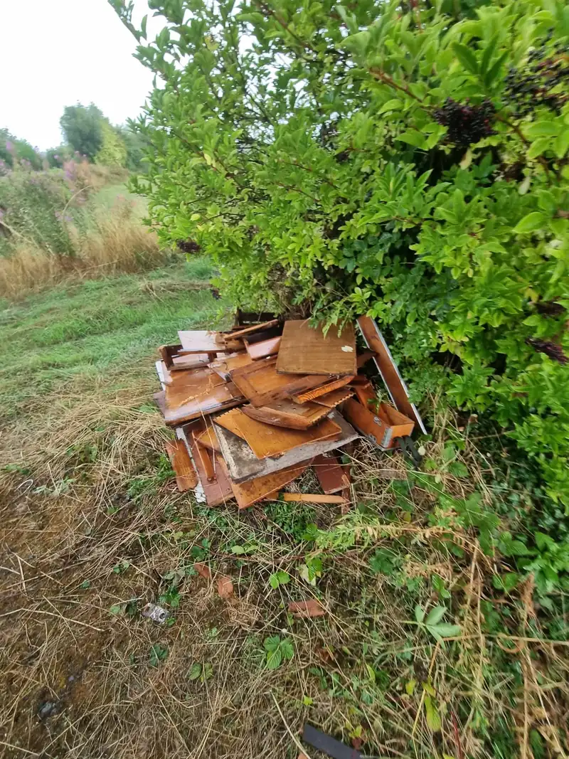 Pile of garden rubbish and broken furniture cleared from a rural property