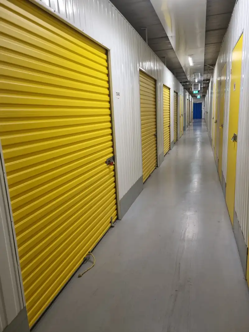 Corridor of self-storage units at a facility where we clear units
