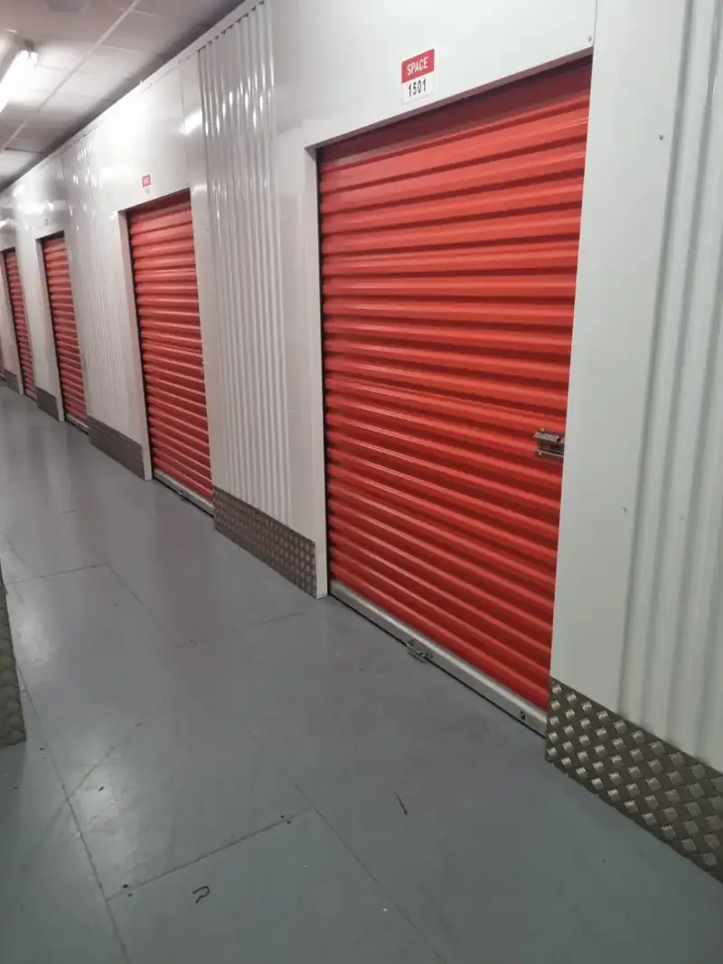 Corridor of self-storage units – storage unit clearance service