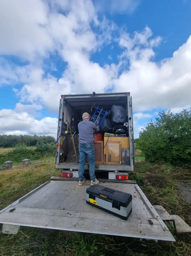 Property Clearance truck being loaded at a country house clearance